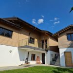 Décapage par aérogommage (sablage) d'une villa en bois à Arzier